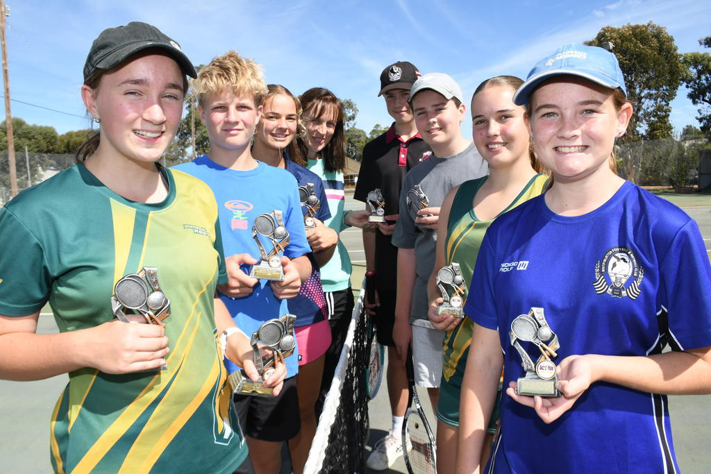 Junior tennis grand final teams, left from front, de Minaur, Milla Eldridge, Evan George, Eljah Keam, Lynley Clyne (absent Lenny Eldridge); right from front, Rafter, Scarlett Mitchell, Tilly Barry, Sully Magee, Zac O'Connor.