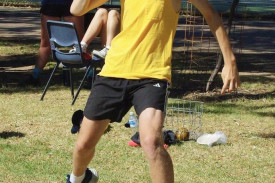 Charlie Martin prepares to aim long in shot put.