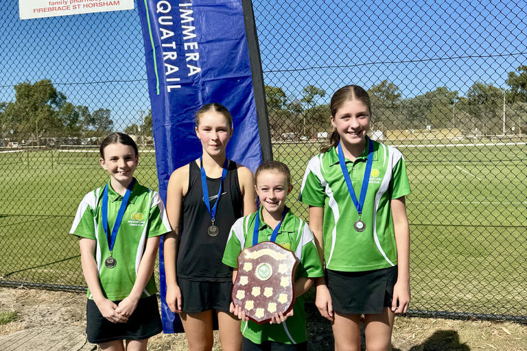 Section 4 girls Zoe Kemp, Ava Ladlow, Zetta Beattie and Greta Smith celebrate their win for Horsham Lawn.