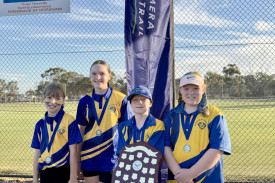 Nina Heard, Laila Combe, Nate Hateley and Olivia Hately show off the match play Section 6 shield won by Natimuk.