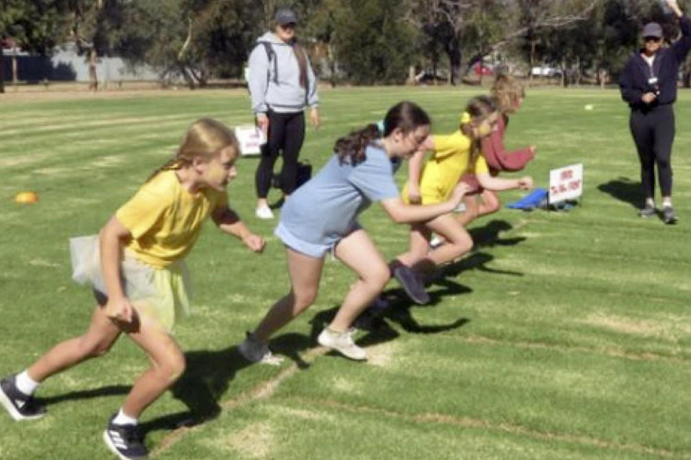 Students take off as they race each other to the finish line.