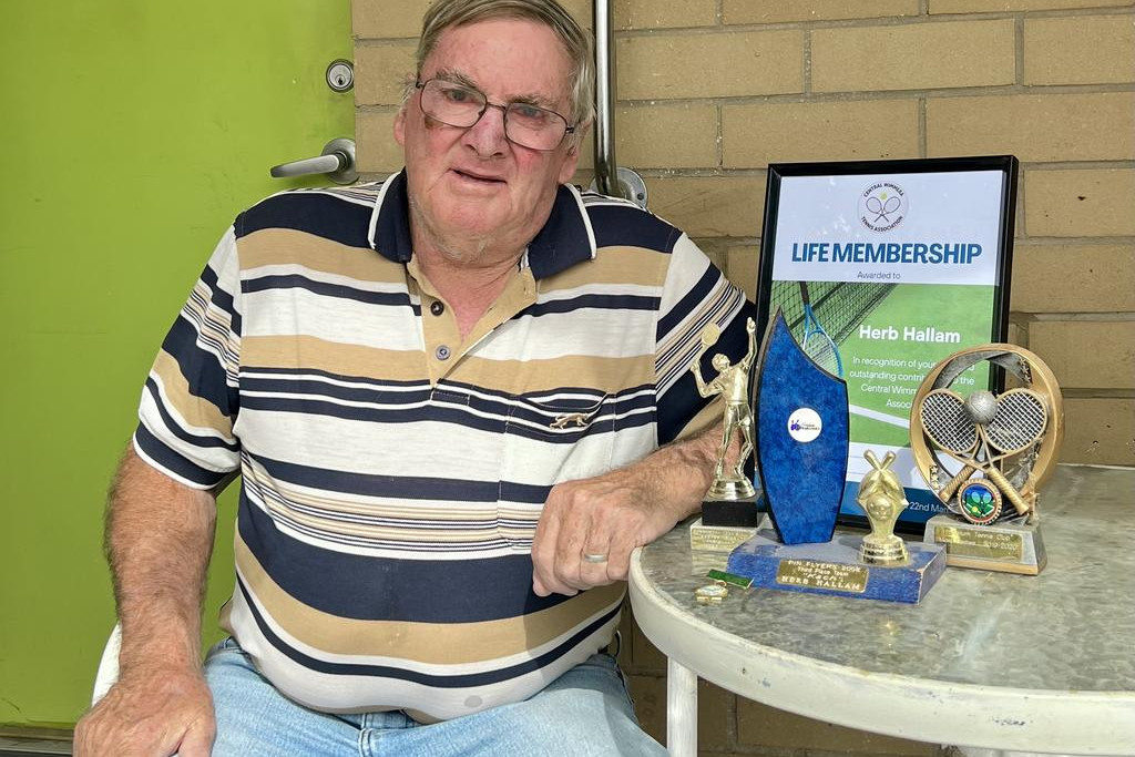 Herb Hallam receives life membership award from CWTA. for over two decades of dedicated service to local tennis.