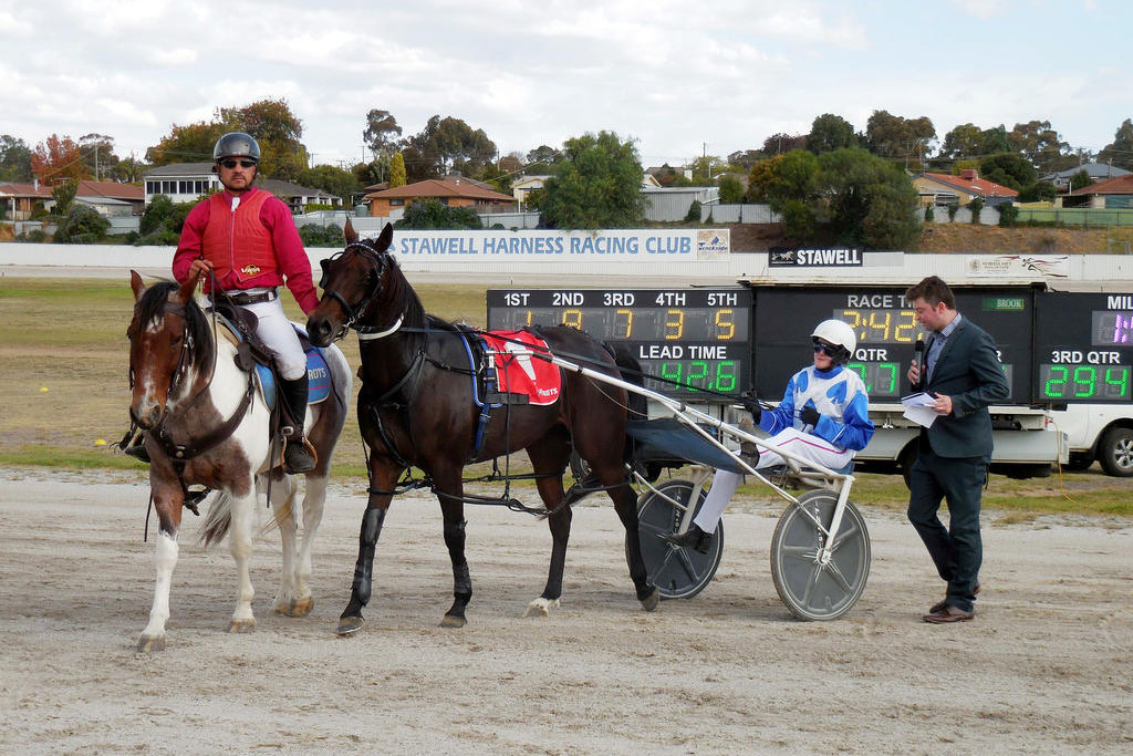Raceday host Tim O'Connor interviews driver Leilani Justice after Sassyola's win at Stawell on Good Friday.