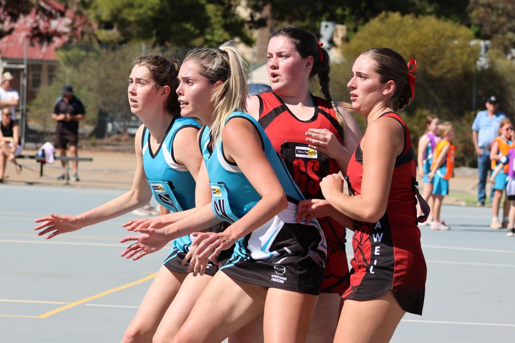 Thunder's Abby White and Sydney Thorogood battle for position against Stawell's Alannah Deutscher and Ayva Mitchel.