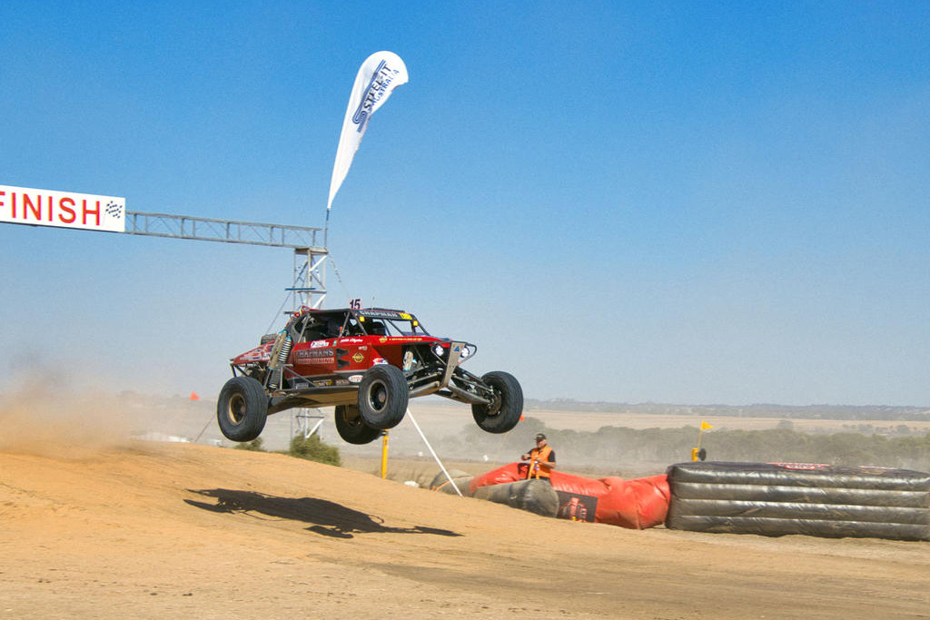 Winners - Clayton Chapman and Adam McGuire crossing the finish line in style