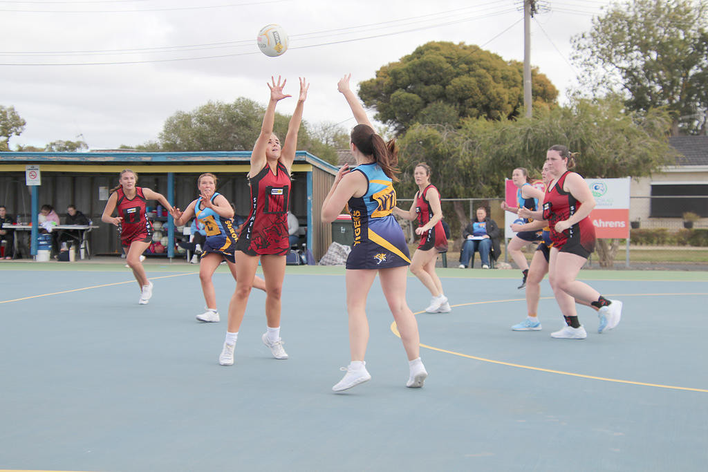 Nhill's Brooklyn Fraser looks to accept the pass from Ash Batson.