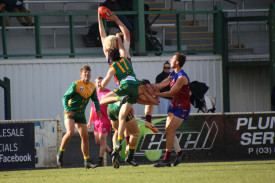 Evan Hunter does his best to spoil the mark by his opposition player.