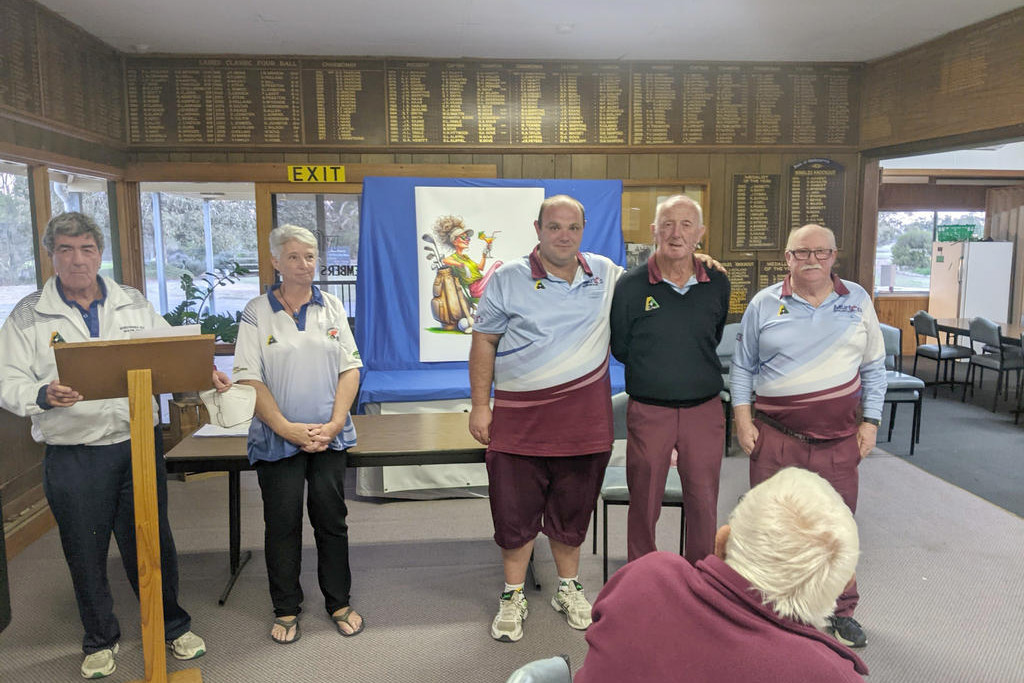 Winners Calvin Pendlebury, Brian (Bones) Hamilton and Toppa Brown with tournament director Wayne Gove and Golf Club president Dawn Walton.