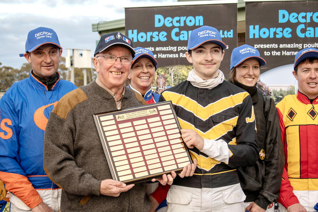 Chris Smith, front left, presents the Noel Smith Memorial Shield to the 2025 Horsham Invitation Drivers Champion Jordan Leedham, as Michael Stanley, back left, Kerryn Manning, Jackie Barker and Jason Lee watch on.