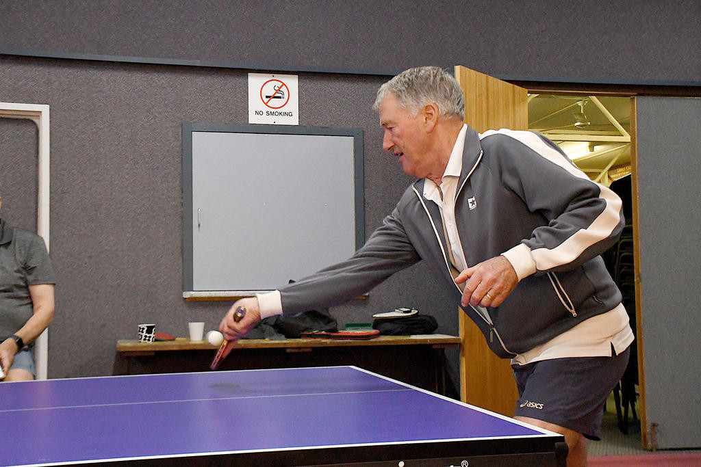 Boolite's Rob Lehmann makes a forehand return.