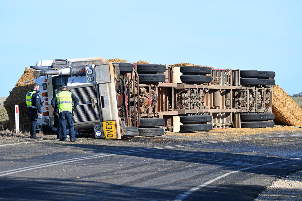 A semi-trailer carrying hay collided with a school bus near Minyip, resulting in a 56-year-old woman being airlifted to The Alfred.