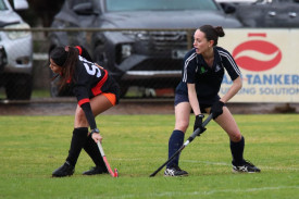Yanac’s Mikayla Mackley has just cleared the ball despite a lunge by Horsham Jets’ Milli Noaillies.