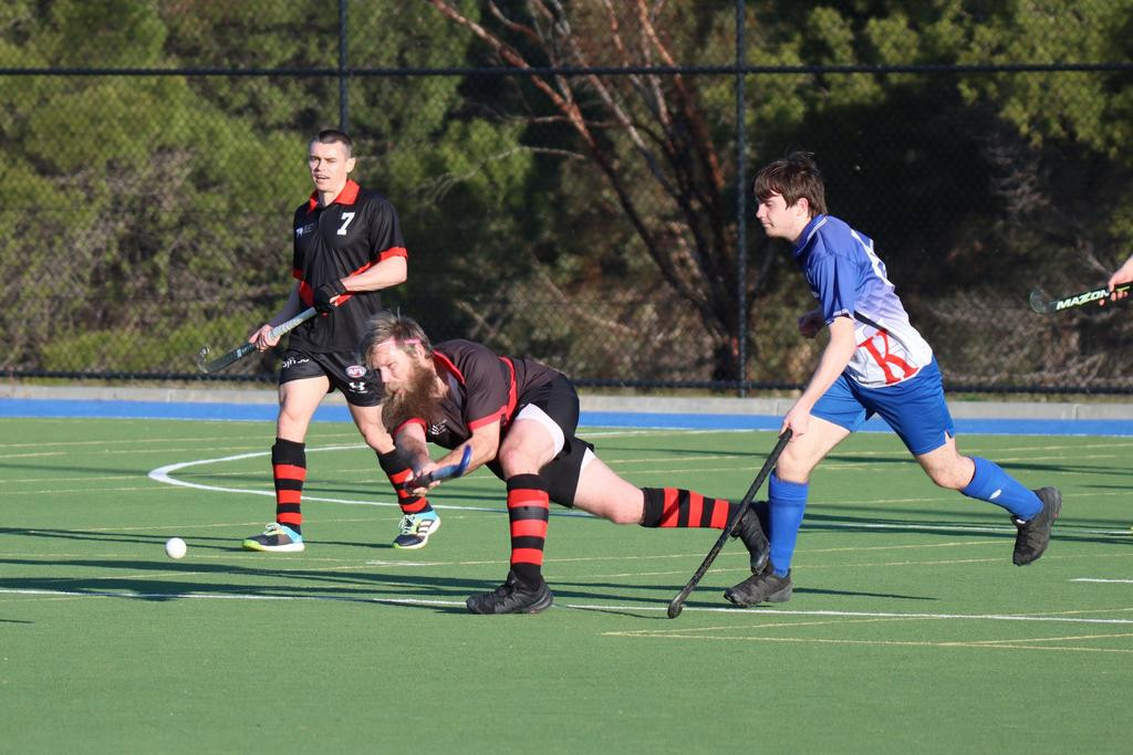 Horsham Hurricanes&rsquo; Aaron Mullane clears the ball out of defence.