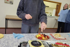 Merv Schbeider from Nhill cuts the cake for his 100th birthday at the Legacy July meeting
