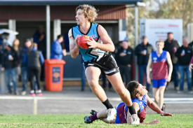 Billy Lloyd escapes the cluthes of his Demon opponent.