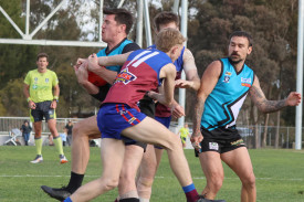 Southern Malee Thunder’s coach Kieran Delahunty takes a strong mark.