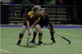 Warrack Hoops’ Heath Johns looks for options while Horsham Hurricanes’ Charles Hassall looks to spoil.