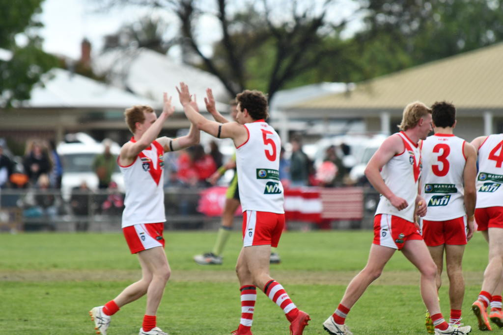 Ararat celebrate a goal in their 91-38 grand final victory over Southern Mallee Thunder.
