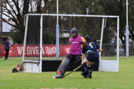 Yanac’s Lexi Farmers takes on Kaniva goalkeeper Briony Williams.