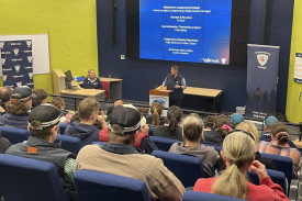 General Manager, Jacinta Langdon presents to the auditorium crowd at Open Day 2025.