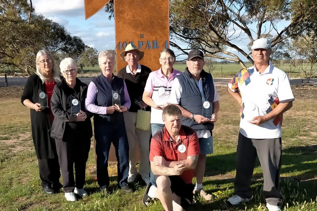 Winners are grinners: Fiona Williams, Ann Morton, Beth Preston, Tony Foley, Deb Lowe, Dennis Kavanagh, Paul Holmes, kneeling Glen Treverton.