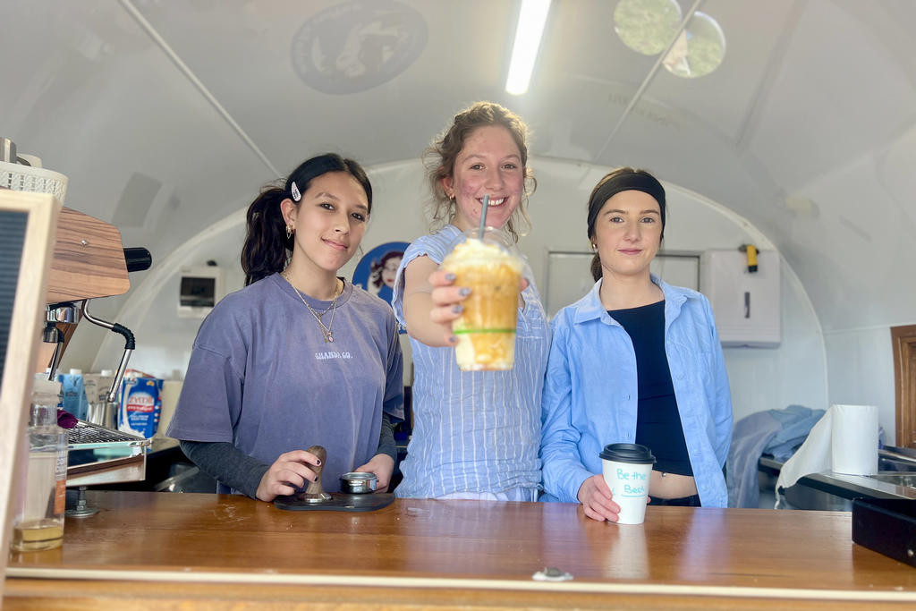 Chantelle, Lilly and Nekeisha served coffee, iced drinks, and food for the last time on Thursday, October 9, ending their year-long PDS class project. Students ran the Grab 'n' Go van each week throughout the year.