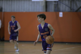 Horsham Hornets under 18 boys’ player Evan Hahn looks up the court.