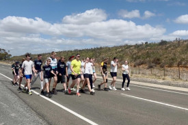 Lochlan Stenhouse was running the last three kilometres of his ultramarathon alongside dozens of Rainbow P-12 College students. The students joined Mr Stenhouse from Rainbow Lake to the end point (school).