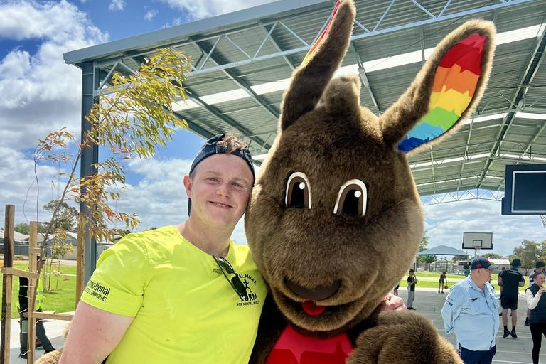 Lochlan Stenhouse hugged Rainbow P-12 College's Jumpy after reaching the final point of his 70-kilometre ultramarathon.
