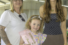 Judges Michelle Searle and Bridget Ismay with Daisy Avery who won the 6-8 girls section.