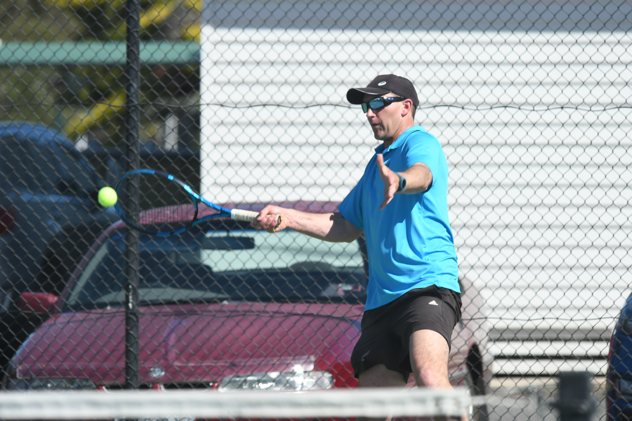 Shaun Alexander, playing for Homers, prepares a forehand in his singles match against Natimuk’s Matt Lee.