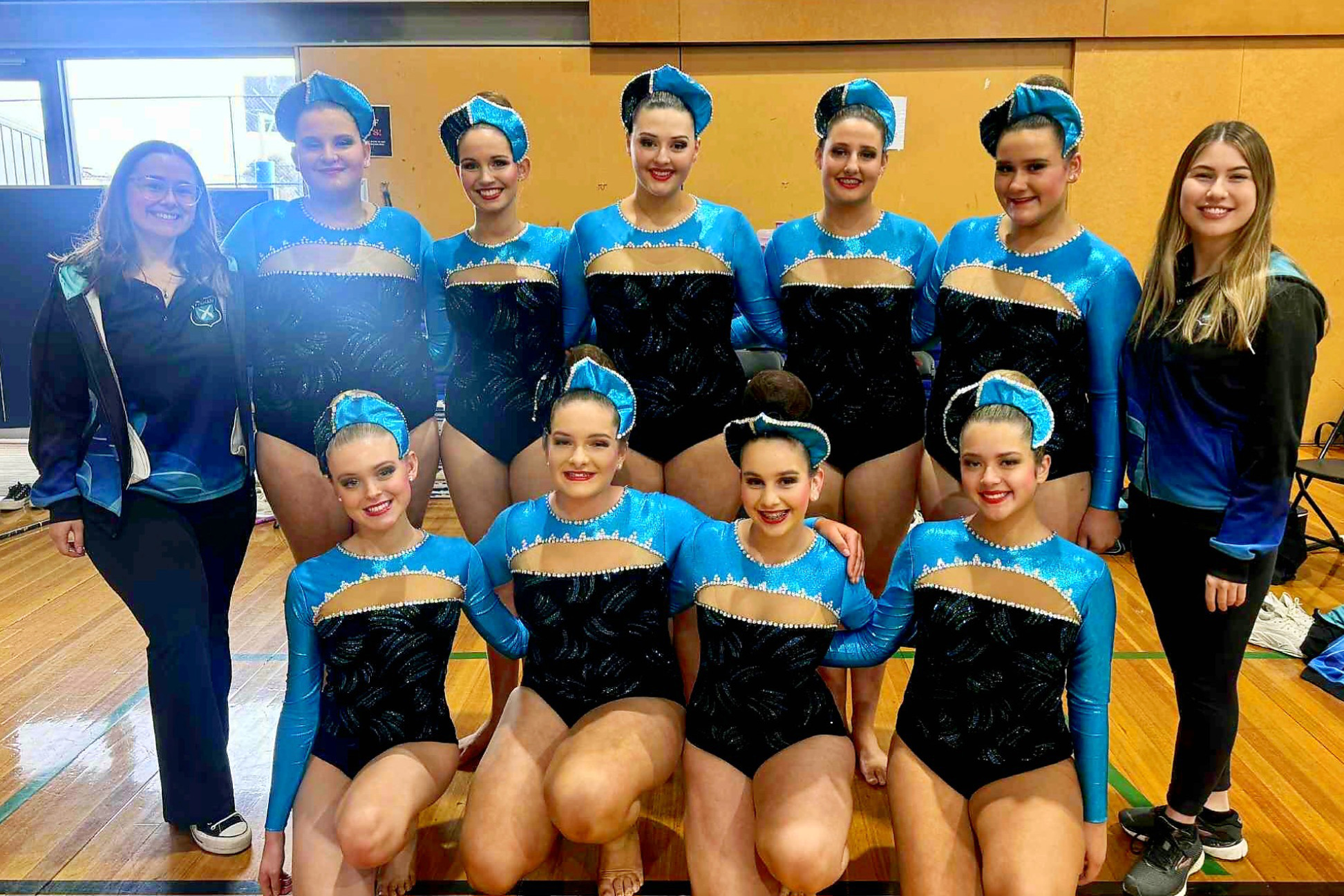 Coach Maddison Cook (Right) and Assistant Ebonie Janetzki (left) preparing the Intermediate Team for their first competition for the season.