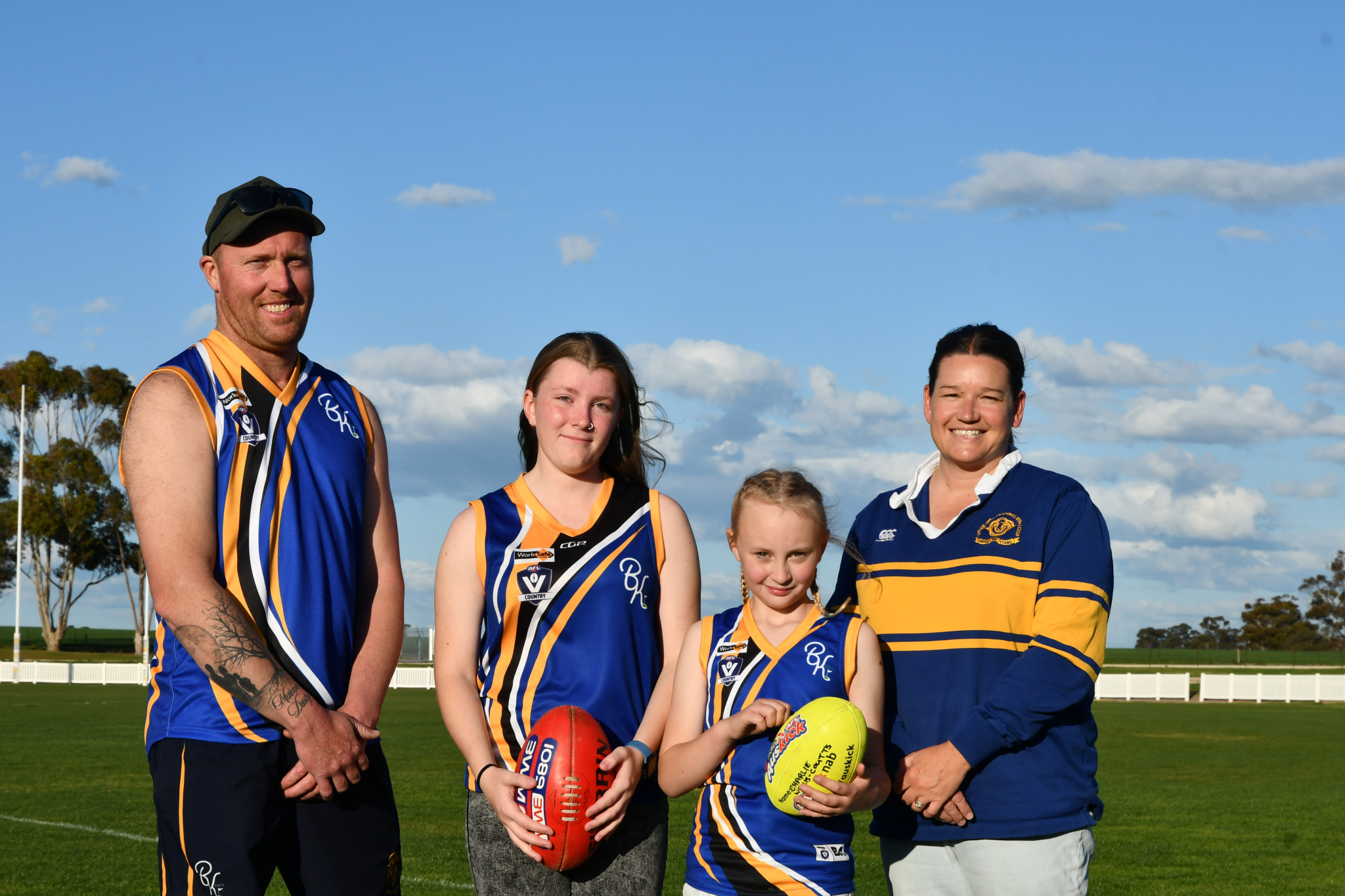 Natimuk United reserves football coach Jono Lovel, Teilah Britten, Charlie Wallis-Coutts, and Natimuk United football director Kate-Lyn Perkin.