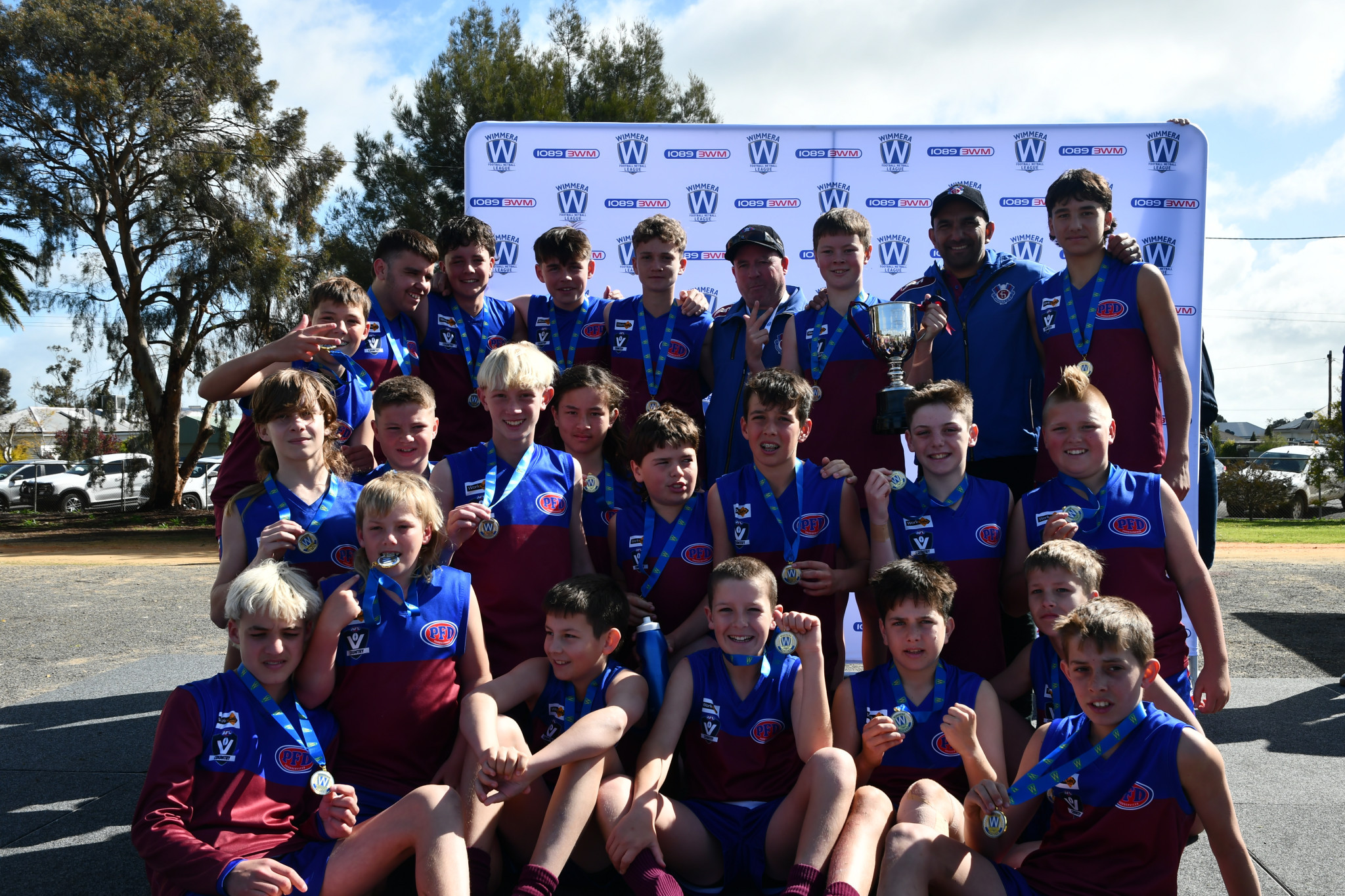 The Horsham Demons celebrate their under 14s premiership after defeating Nhill 28-23 in Saturday's grand final.