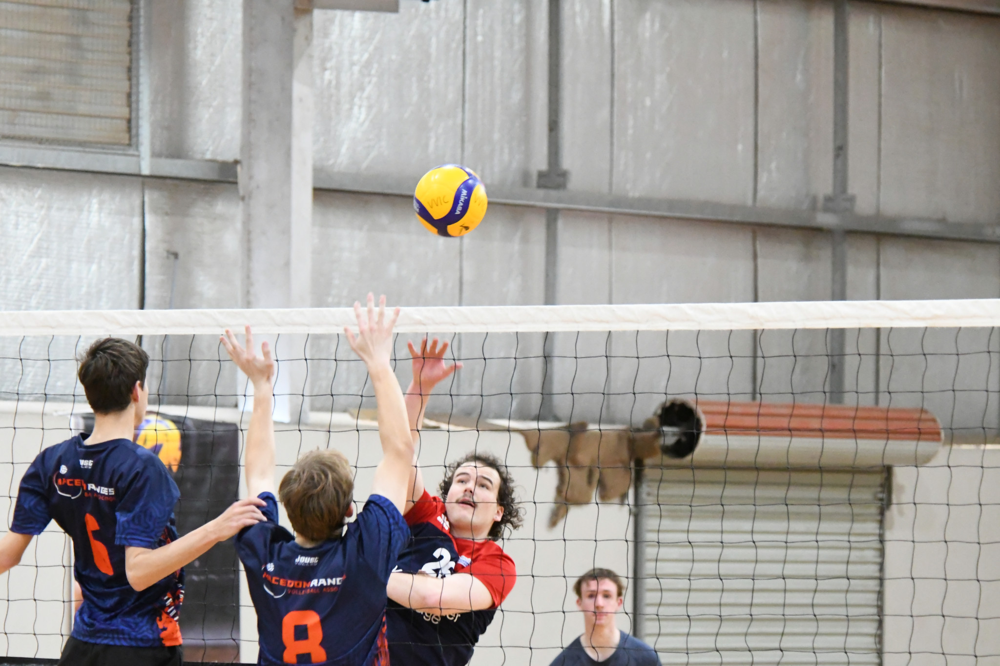 Horsham's under 19 boys captain Malachy O'Brien spikes a shot over the net against Macedon Ranges at the Volleyball Victoria Junior Country Championships.