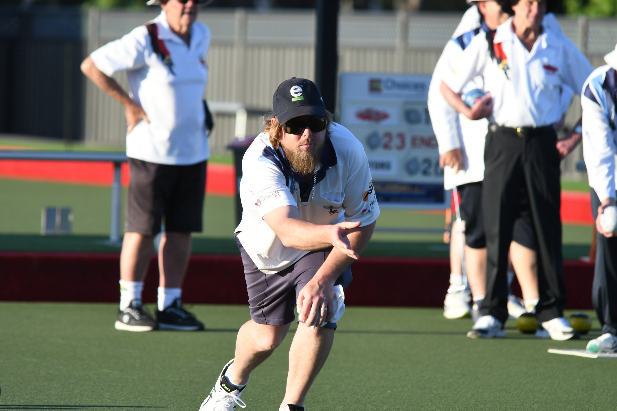 Horsham Golf's Bradley Robinson scans his bowl during his side's clash with Coughlin Park in the opening round of Wimmera lawn bowls pennant competition.