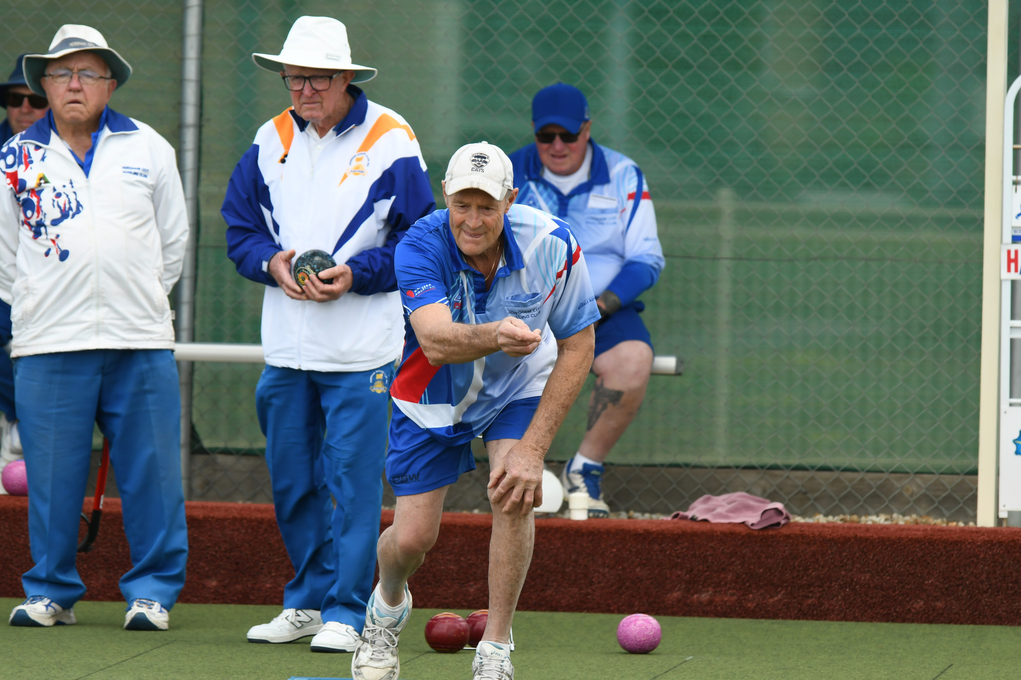 Horsham City's Bruce Campbell tracks his bowl during his team's division-one matchup with Sunnyside.
