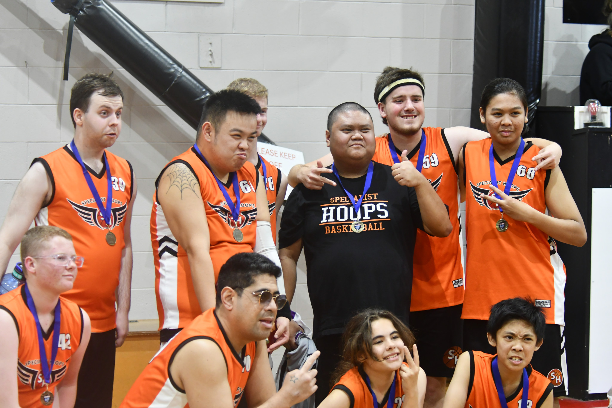 The victorious Bacchus Marsh team pose with their medals.
