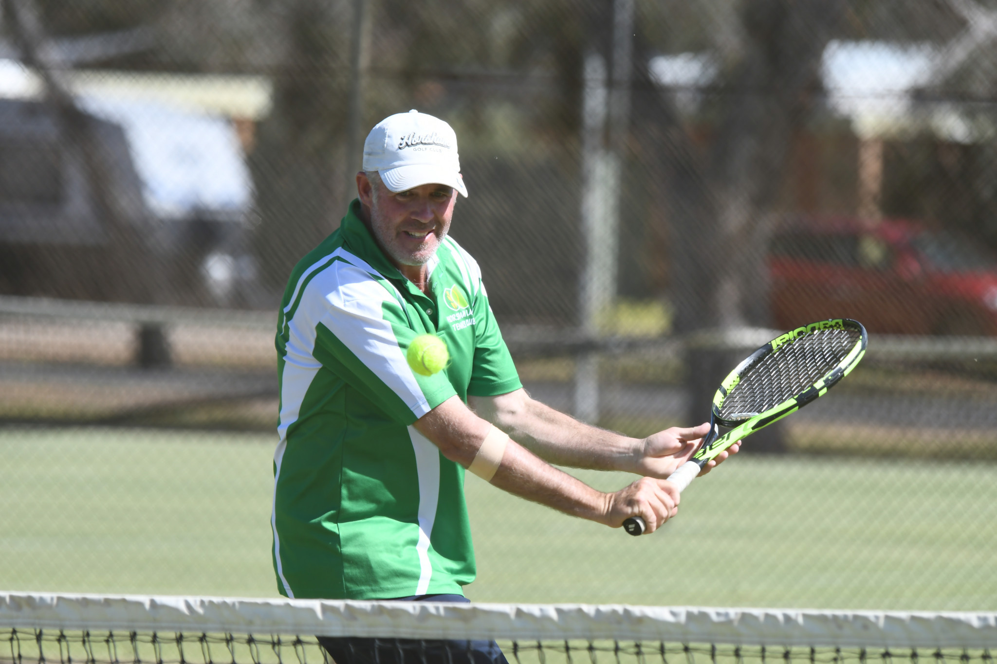 Graeme Wood prepares a backhand volley in one of Horsham Lawn's rubbers against Central Park in round three of the CWTA pennant competition.
