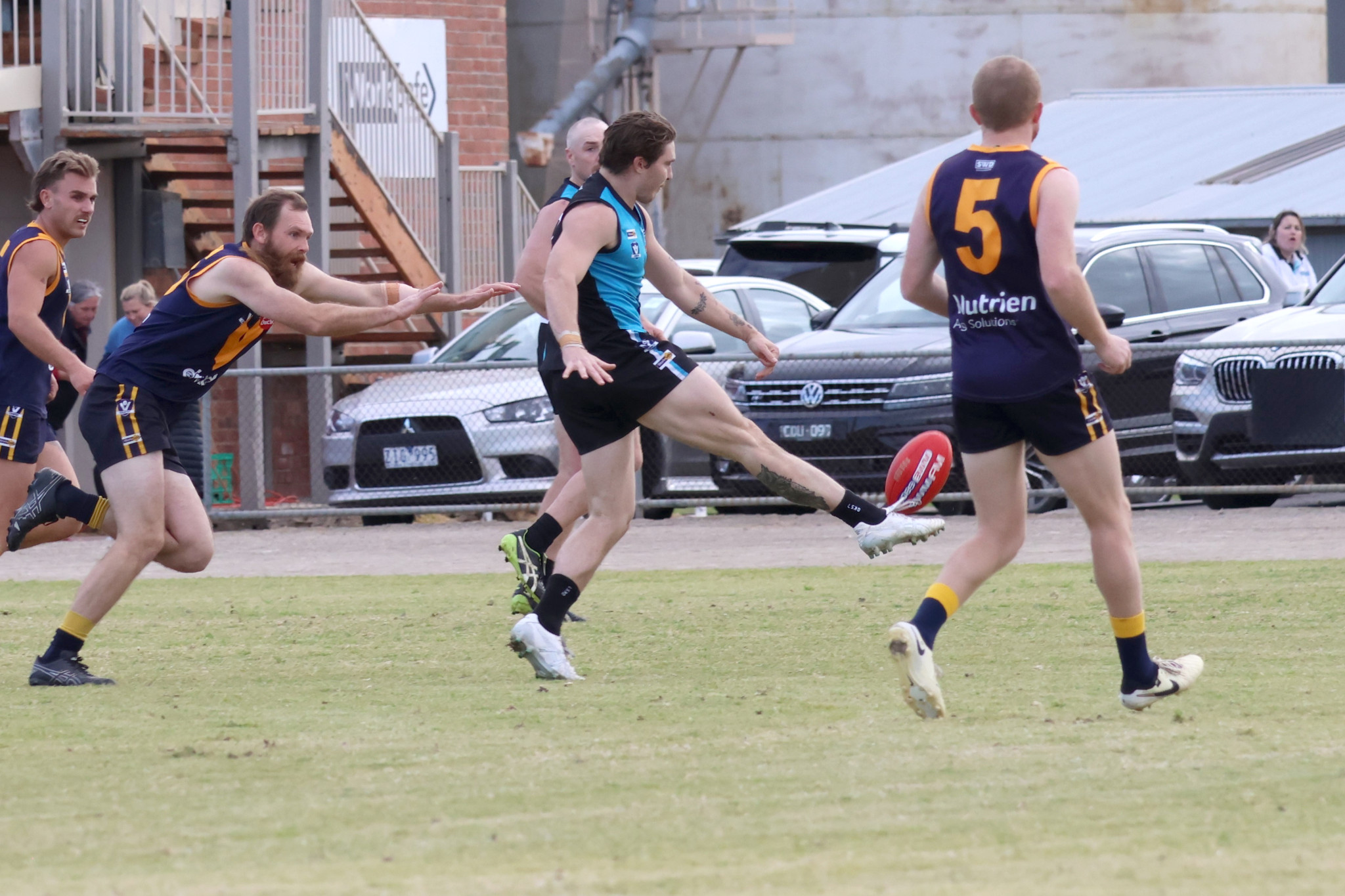 Reece Groves kicks boots one of his two goals for the Thunder.