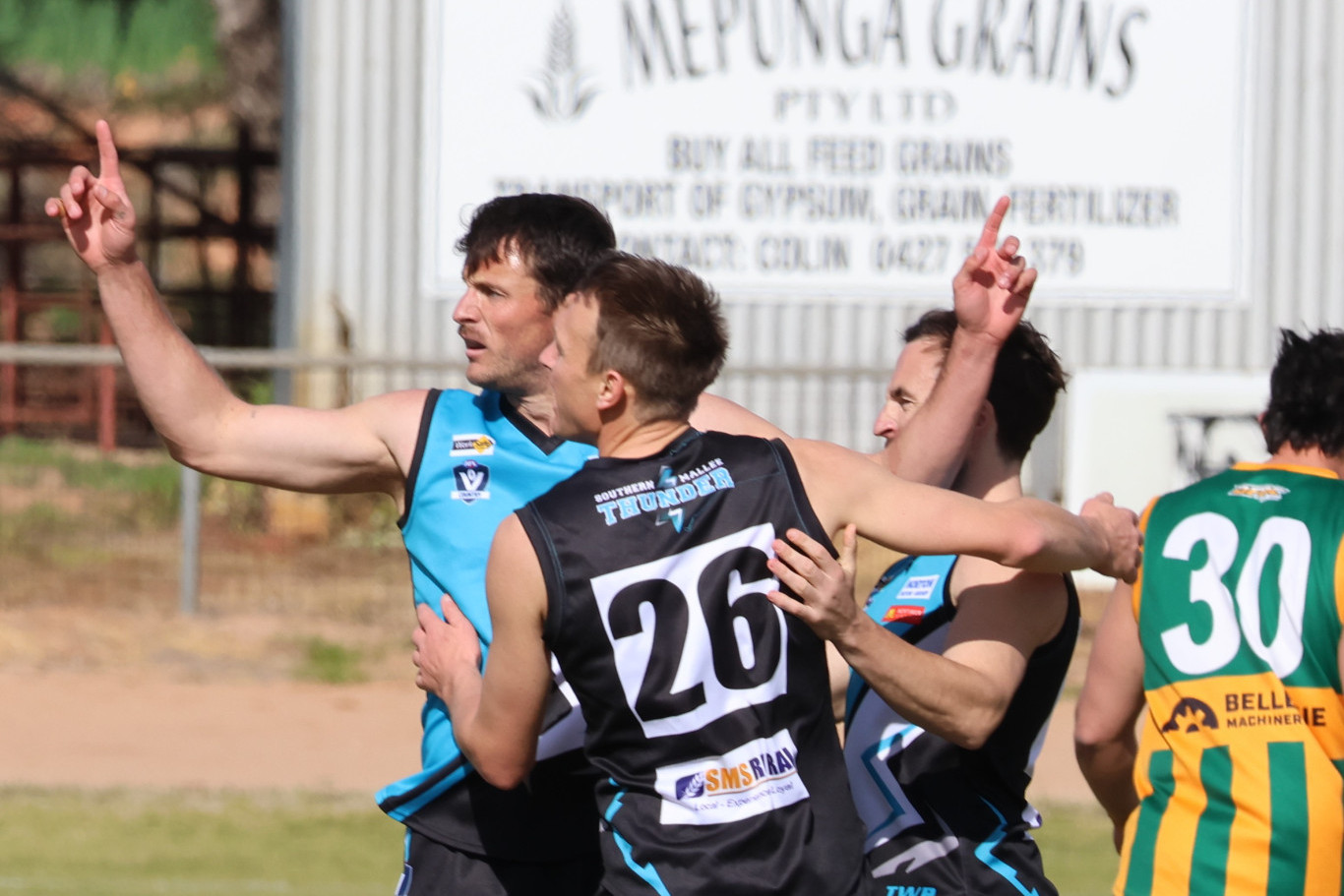 Souther Mallee Thunder's Angus Dewar, Coleman Schache and Rupert Sangster celebrate a goal. Photo: LES GRAETZ