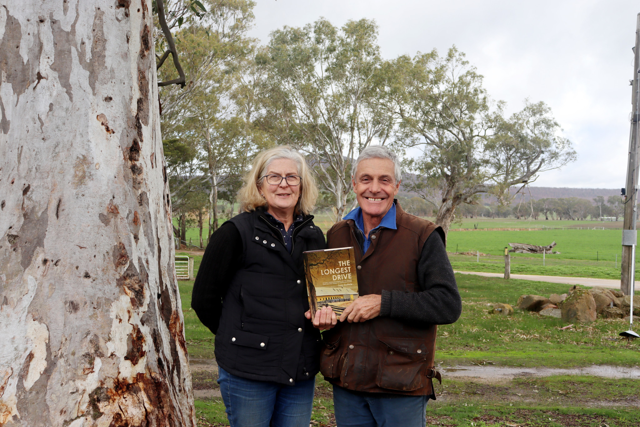 Sarah and Tom Guthrie with the finished account of his great-grandfather's legacy and the longest sheep drive ever recorded in Australia.