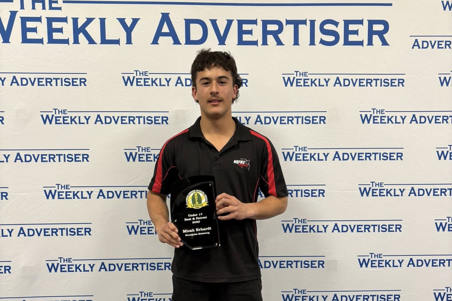 Noradjuha Quantong's Micah Erhardt with his HDFNL under 17s football best and fairest award.