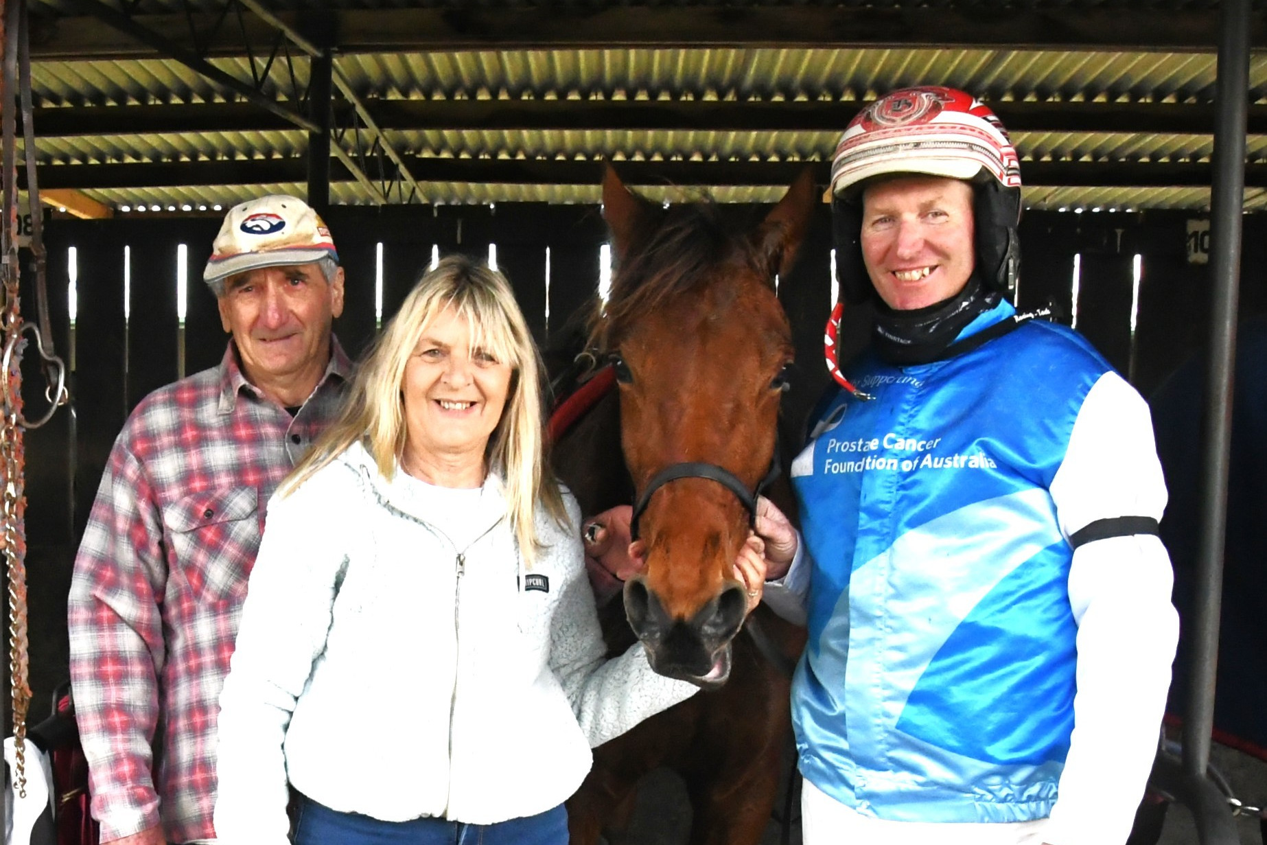 Kewell owner-trainer Daryl Prosser, Judy McCarthy & driver Michael Bellman after the win of Ataboy Charlie at Maryborough on Monday afternoon.